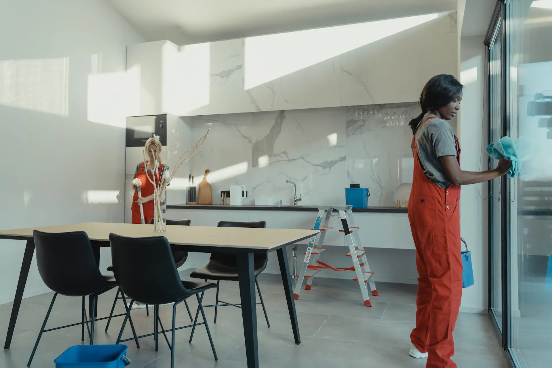 Cleaning crew working in a commercial kitchen